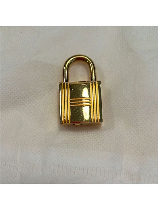 Hermes Handbags - Hermes Gold Cadena Lock #101